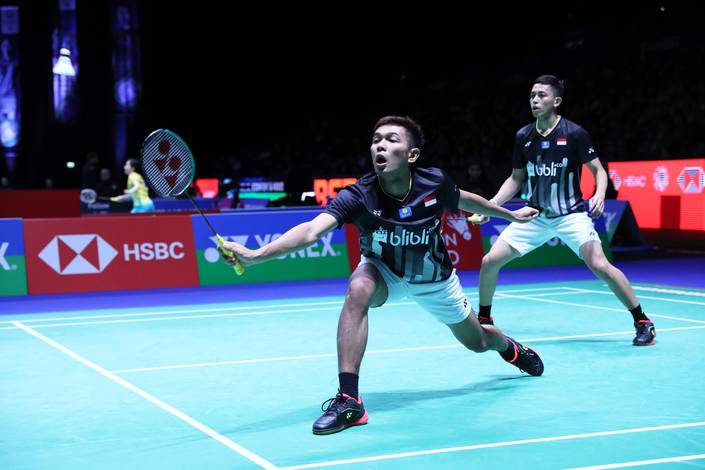 Fajar Alfian/Muhammad Rian Ardianto (Indonesia) mengembalikan shuttlecock. Fajar Alfian/Muhammad Rian Ardianto (Indonesia) mengembalikan shuttlecock.