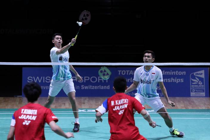 Fajar Alfian/Muhammad Rian Ardianto (Indonesia) mengembalikan shuttlecock. Fajar Alfian/Muhammad Rian Ardianto (Indonesia) mengembalikan shuttlecock.
