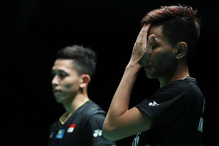 Ekspresi kekecewaan Fajar Alfian/Muhammad Rian Ardianto (Indonesia). Ekspresi kekecewaan Fajar Alfian/Muhammad Rian Ardianto (Indonesia).