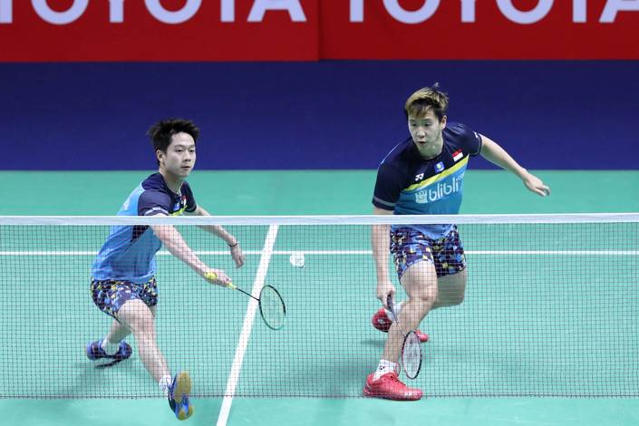 Kevin Sanjaya Sukamuljo/Marcus Fernaldi Gideon (Indonesia) bersiap menyambut pengembalian.