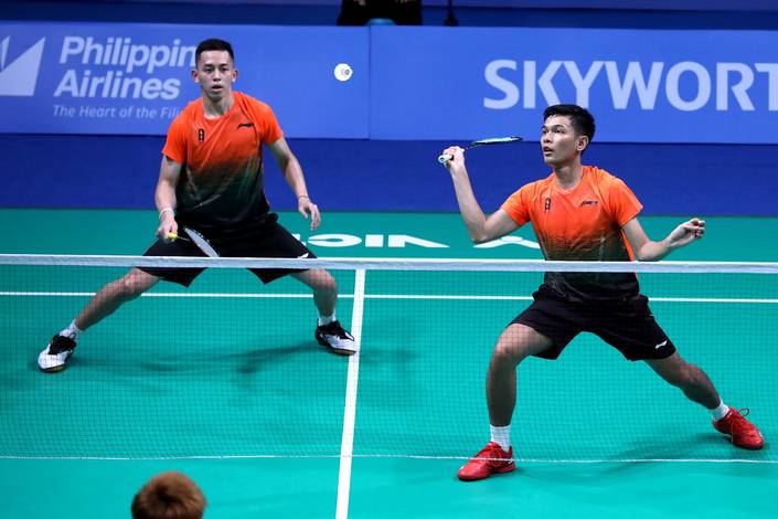 Fajar Alfian/Muhammad Rian Ardianto (Indonesia) bersiap menghadang pengembalian. Fajar Alfian/Muhammad Rian Ardianto (Indonesia) bersiap menghadang pengembalian.
